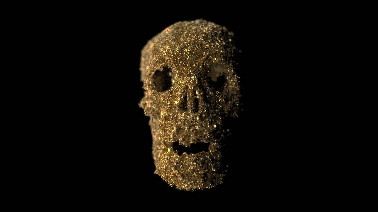 Teschio di glitter dorato che ruota su sfondo nero