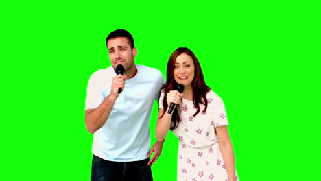 Freunde-Tanzen-Und-Singen-Auf-Greenscreen