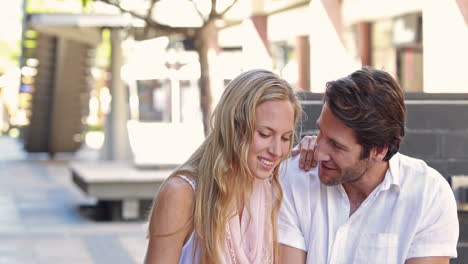 happy couple using tablet together