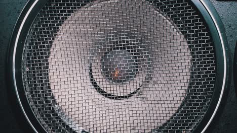 the movement of the vintage paper membrane of acoustic subwoofer speaker. bass vibration and playing