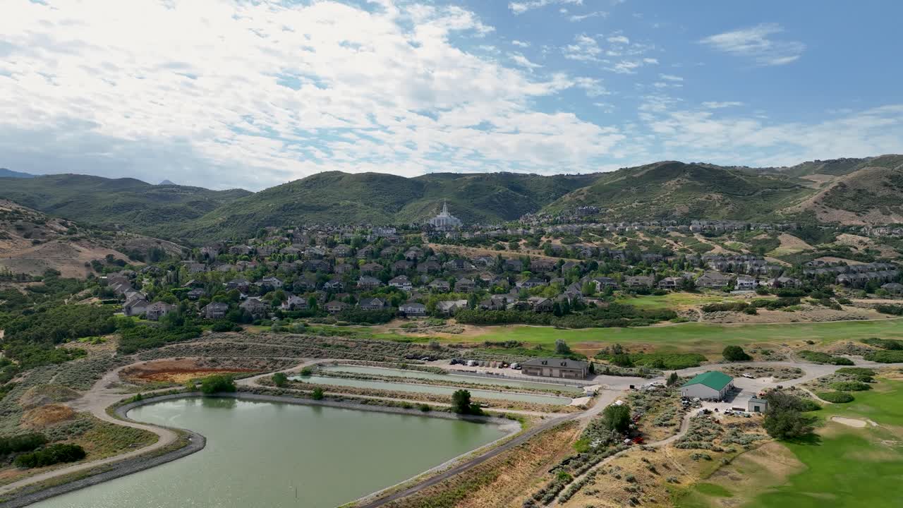 Pull Back Aerial View Of Mountain, The LDS Temple And South Mountain Golf Course In Draper, Utah