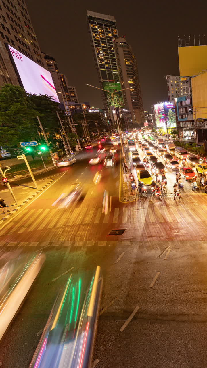 timelapse of rush hour traffic in central bangkok at night in vertical