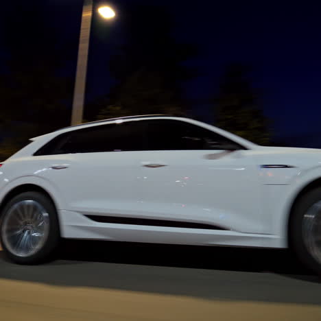 presentation of a white audi e-tron, compact luxury crossover suv. modern new cars for sale