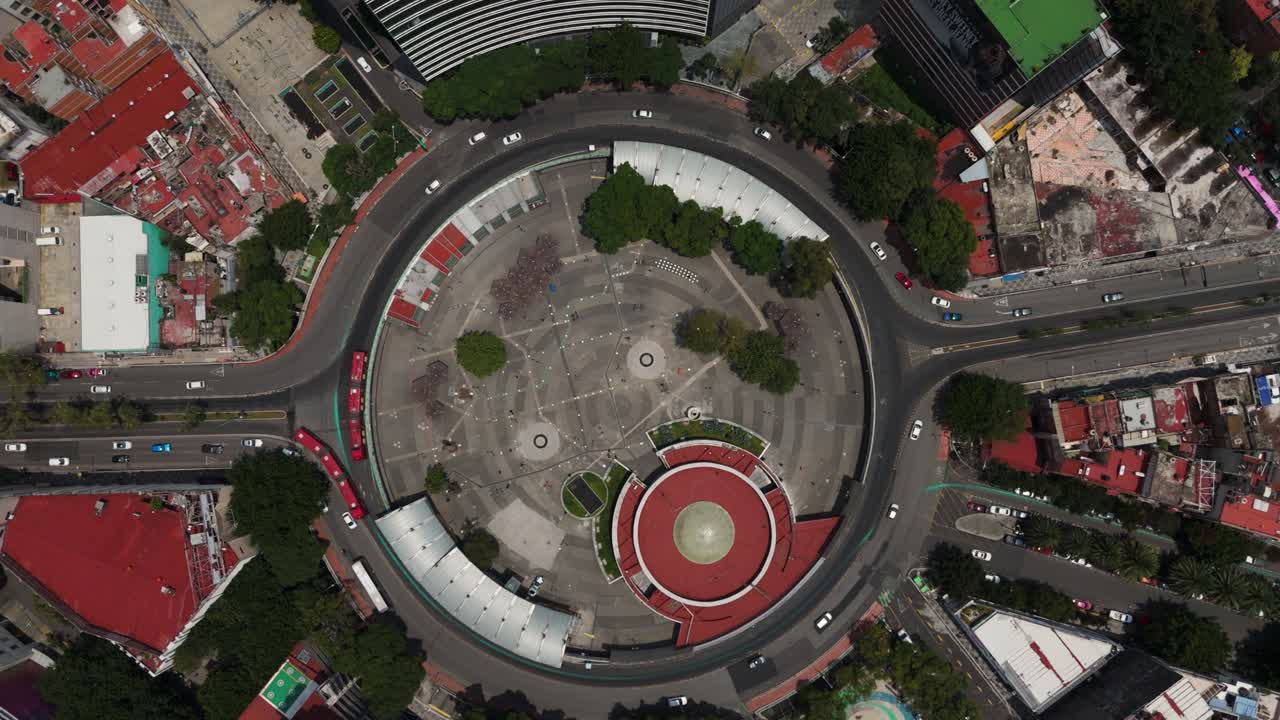 Aerial, top-down view of Insurgentes Metro roundabout in Mexico City, captured by a drone