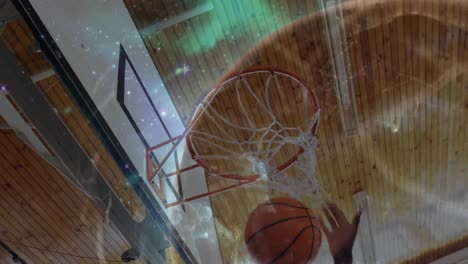 animation of networks of connections with globe over african american male basketball player at gym