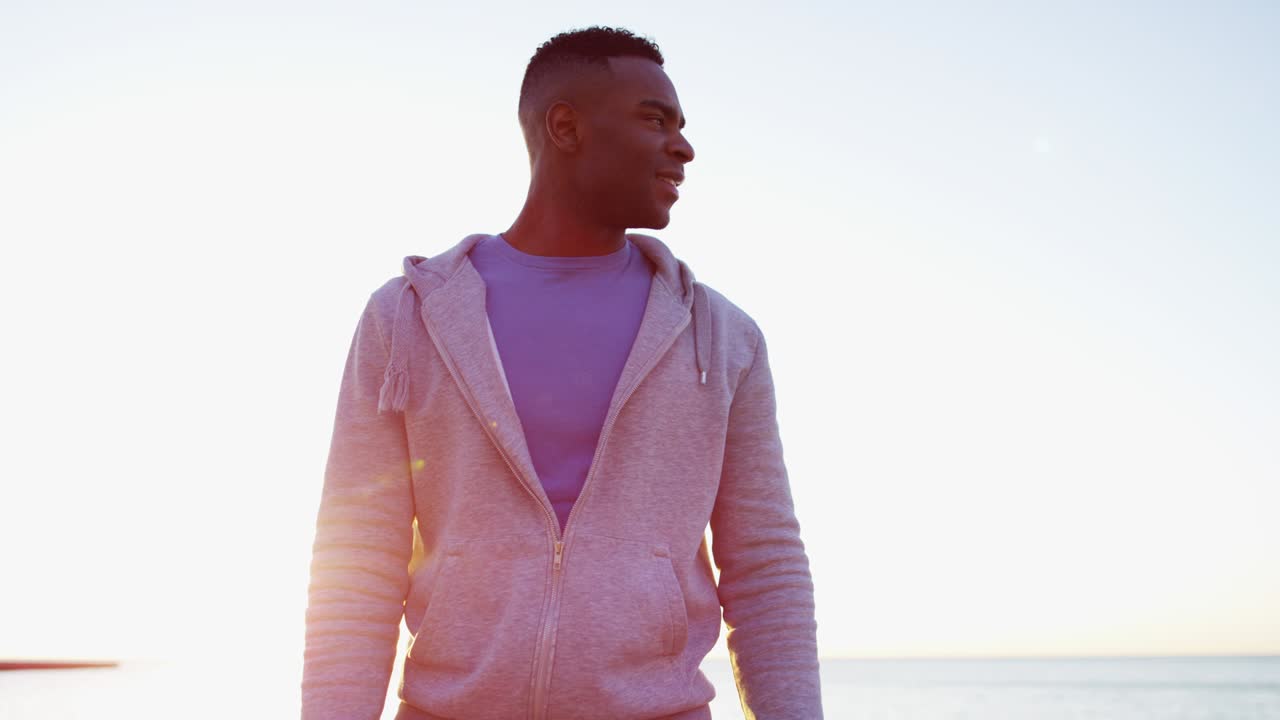 African American male doing cardio fitness training outdoors