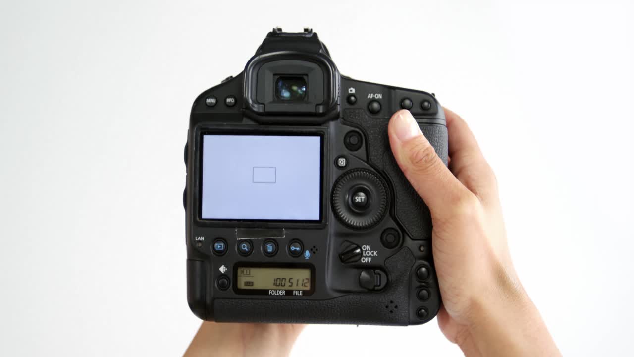 Photographer taking photo with vintage camera