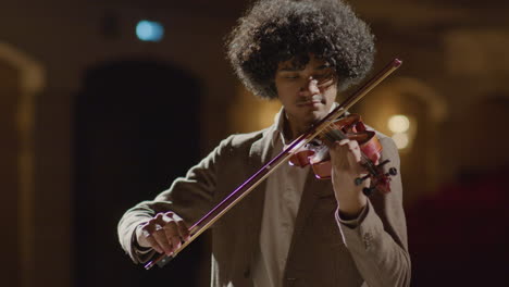 virtuoso violinist performing on stage