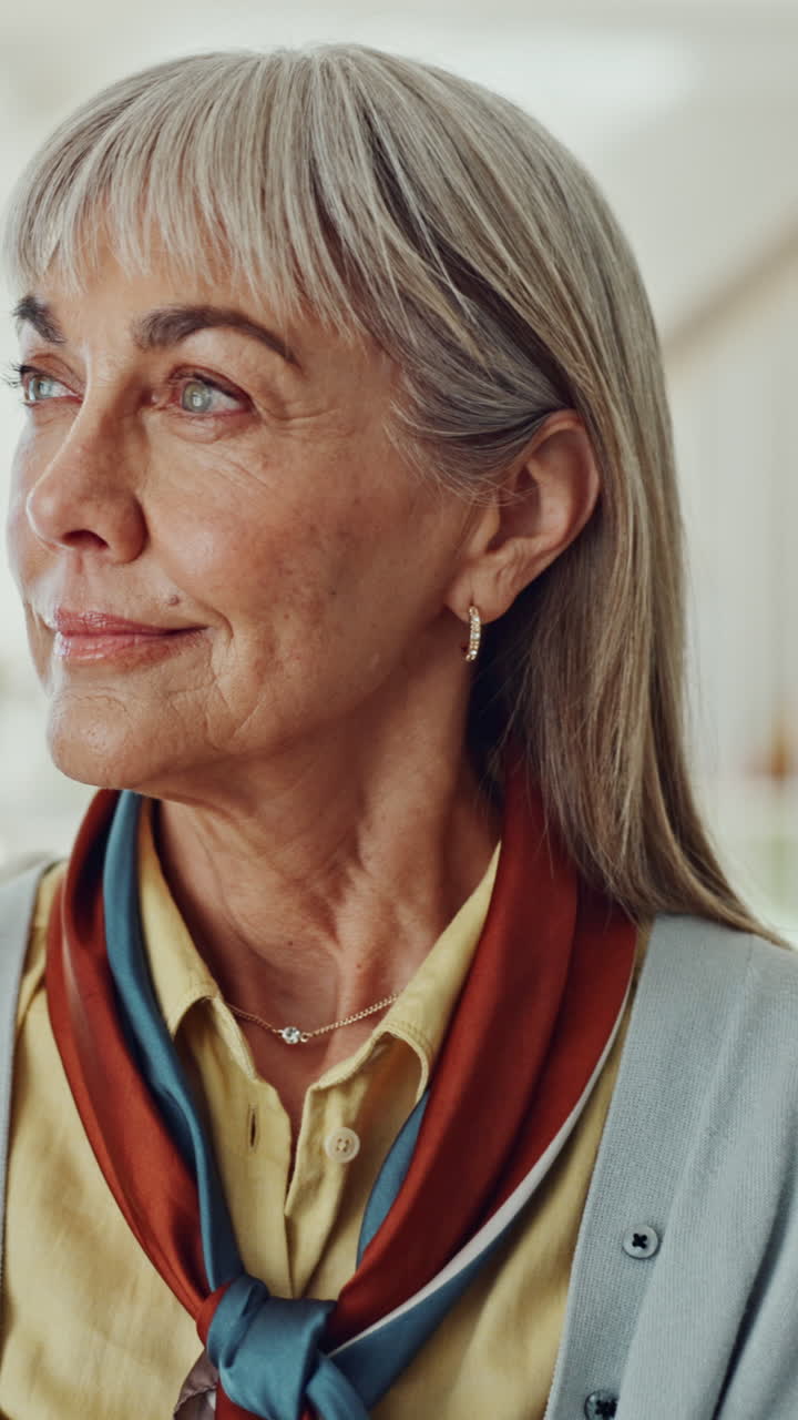 Close-up Portrait of a Serene Mature Woman Smiling
