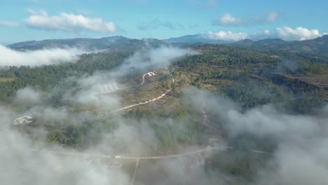 4k Drone shot of mountains in the morning with white fog
