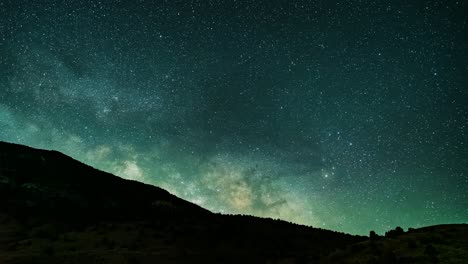 Milky-Way-core-rises-above-the-mountain-ridge---starry-time-lapse