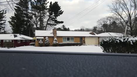 Soft-snowfall-as-seen-from-the-bed-of-a-parked-truck