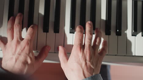 detailed close-up of hands elegantly playing a piano, focusing on the interaction between fingers and keys. the depth and precision of musical expression