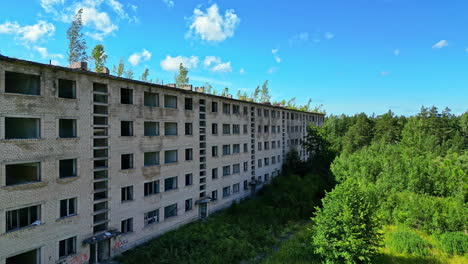 aerial lost place, old soviet union apartment block building, nuclear wasteland