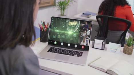 Caucasian-businesswoman-using-laptop-for-video-call-with-diverse-business-colleagues