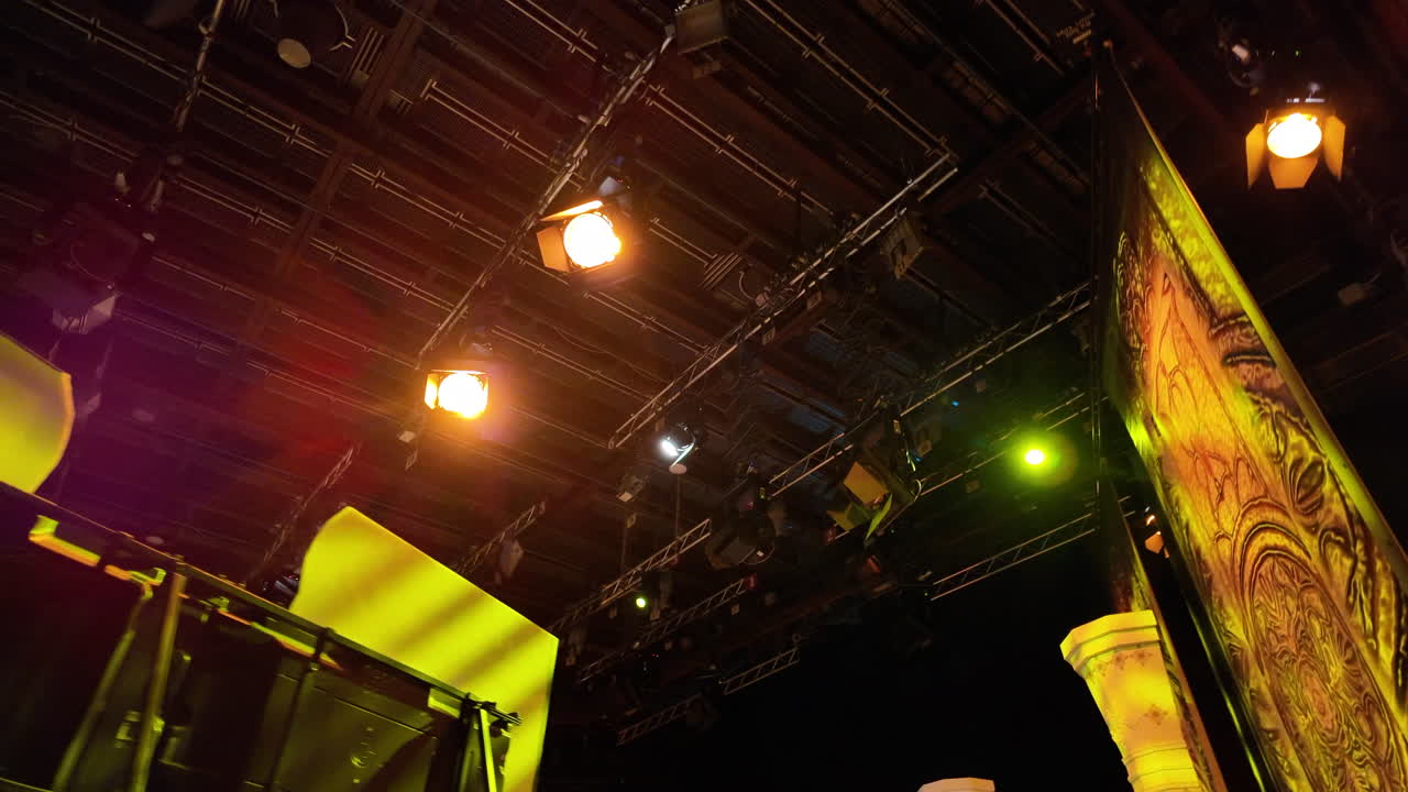 Flashing studio lights equipment on the ceiling of a TV set