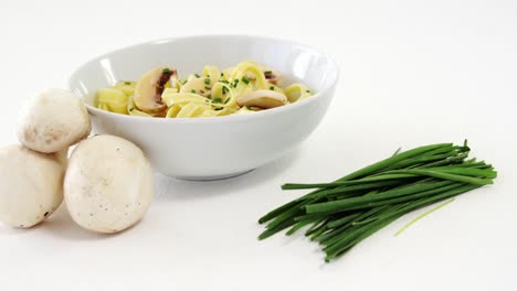 bowl of pasta with mushroom