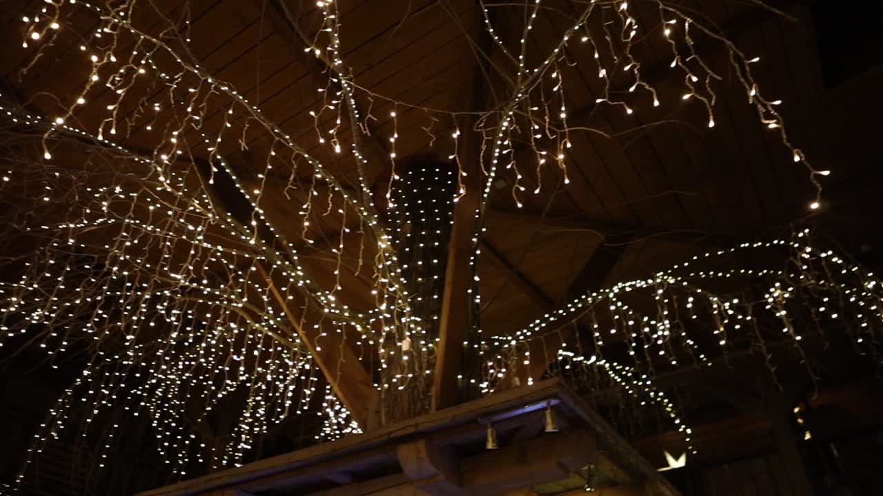 Pan up to an amazing decorated glowing tree