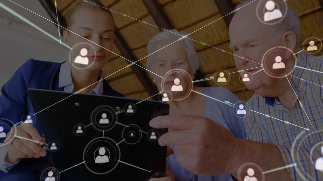 red de iconos de conexión contra la doctora y la pareja senior usando tableta digital