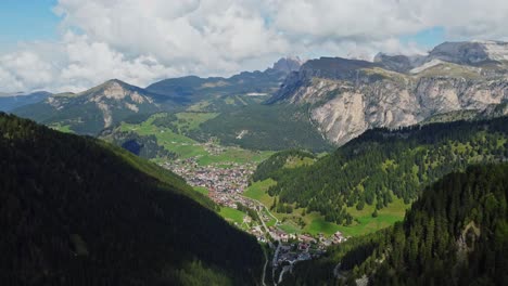 drone shot of a town in italian alpine