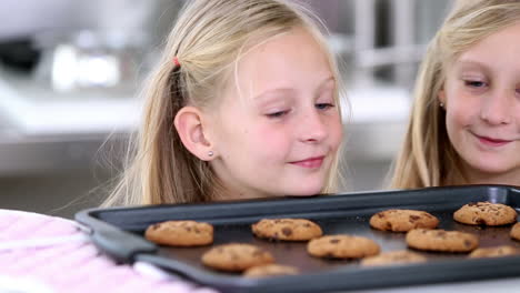 sisters looking at cookies