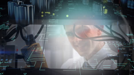 Close-up-of-man-working-on-mainframe-computer-while-circuit-board-moves-in-foreground