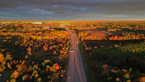 aerial fall morning light over a highway