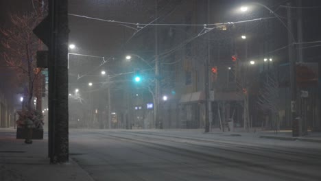 Green-Traffic-Light-Turned-Into-Red-On-Empty-Road-During-Winter