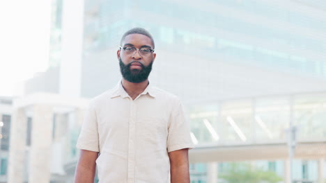 young black man stand in the street