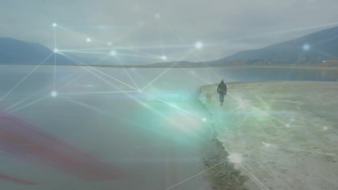 Man stepping into view and walking lakeshore with pulsing tech overlay nodes, lines