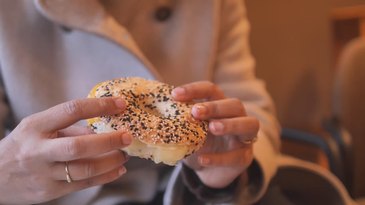 Bagel Sandwich in Hands