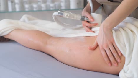 vacuum massage in a beauty salon anticellulite correction of the figure a woman in a beauty salon vacuum massage in a beauty salon anticellulite correction of the figure a woman in a beauty salon