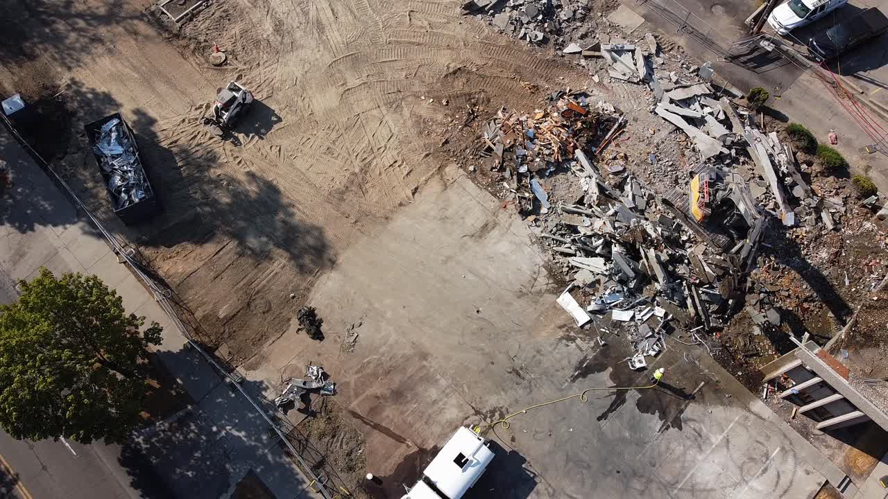 Aerial shot of the demolition of a building.