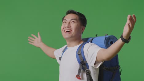 happy traveler with backpack