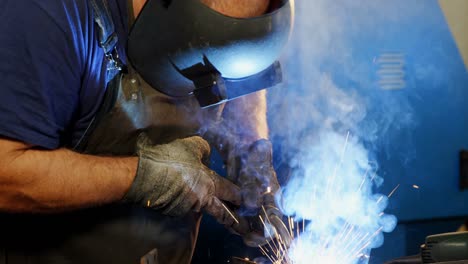 Welder-welding-a-metal