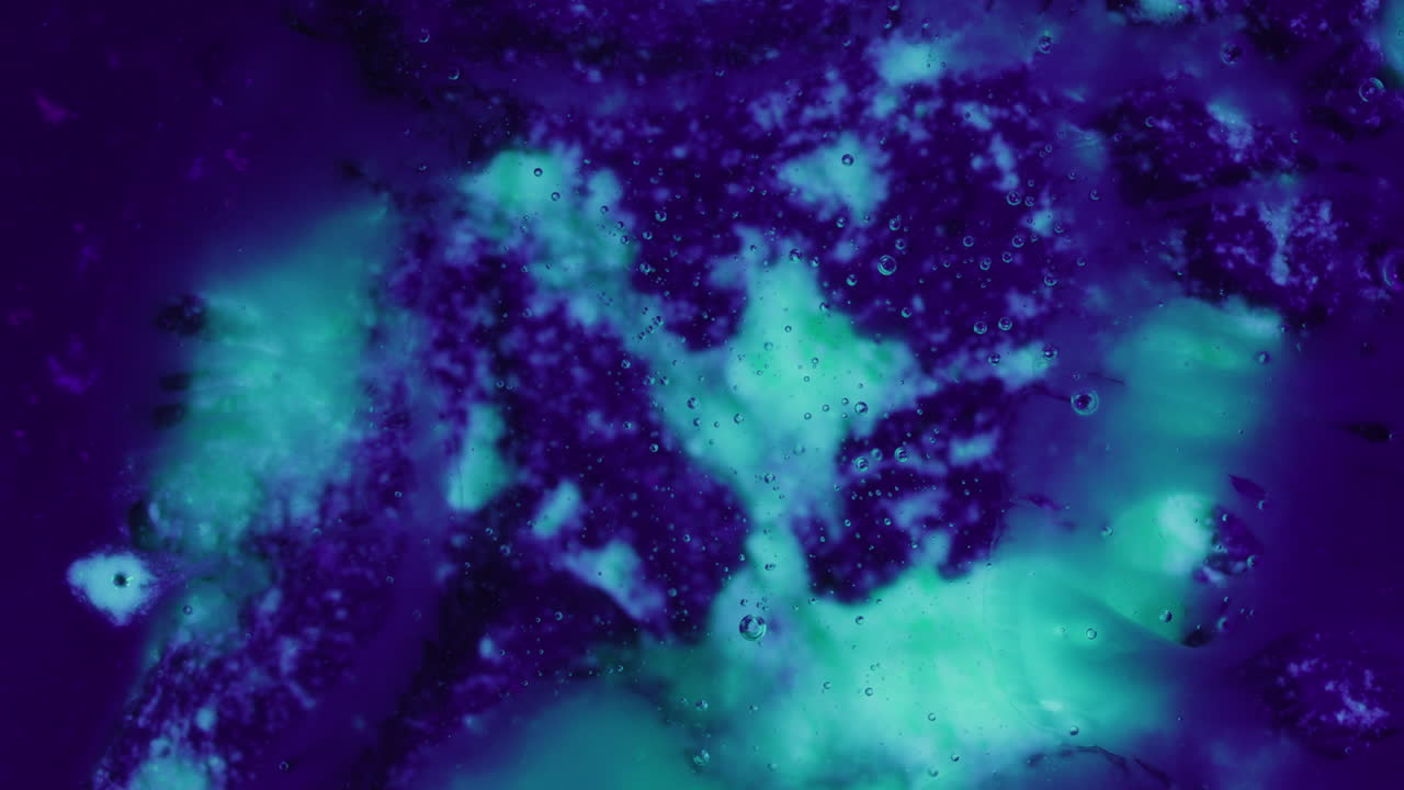 Neon Green Patches Of Colour In Deep Purple Abstract Fluid Spinning Shot