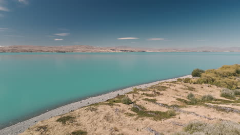 turquoise lake with mountain scenery