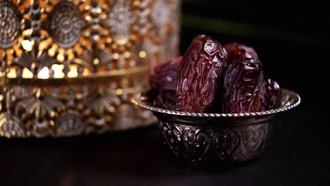 ramadan concept, date fruit and lantern.