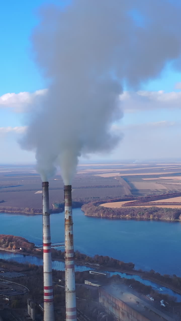 Toxic production company enterprise. Smoking from factory tube.