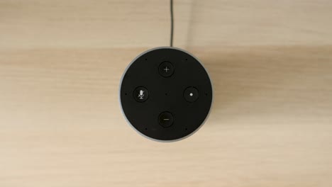 voice activated smart home device turns on, top down close up