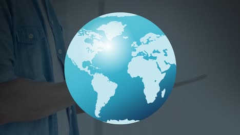 animación del globo sobre las manos de un hombre caucásico usando una tableta