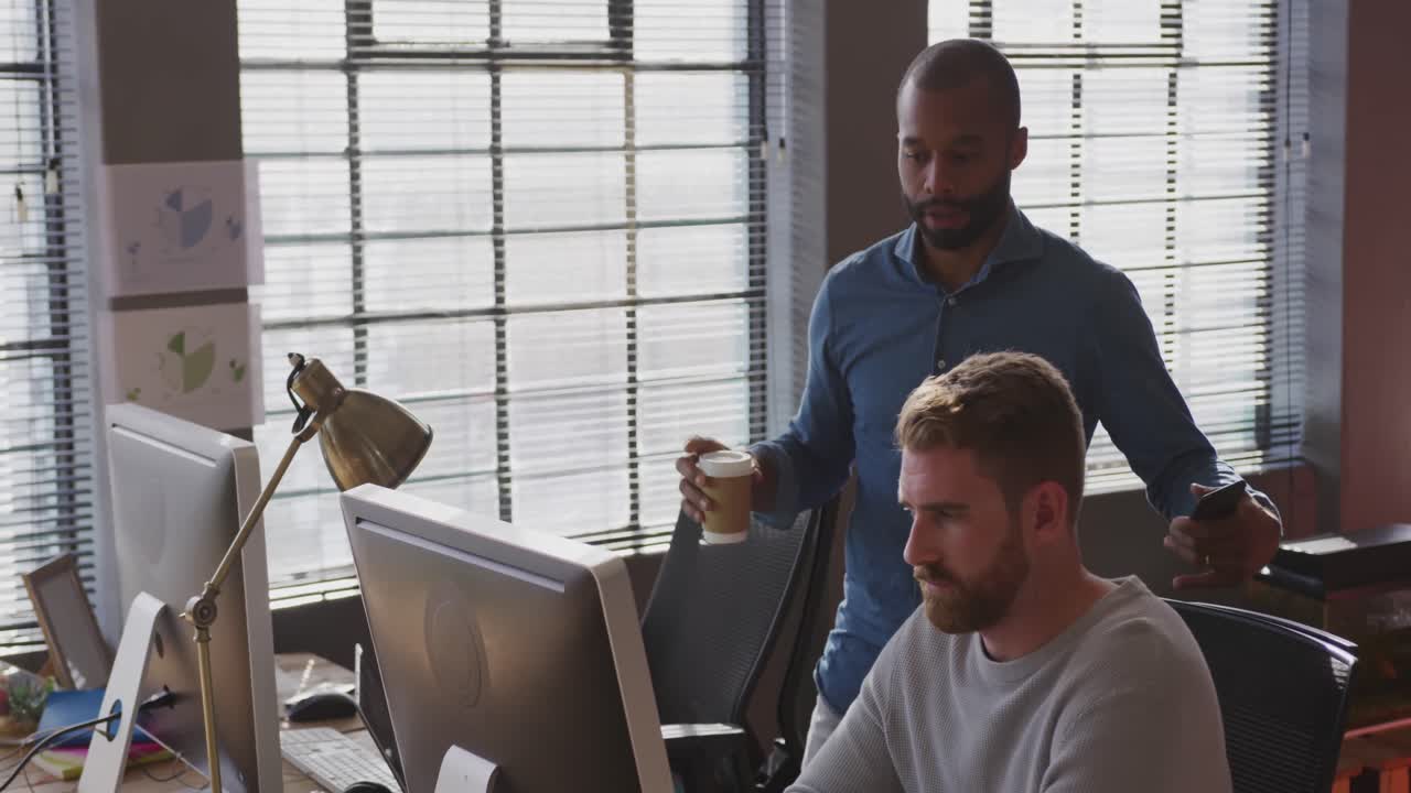 Young creative professionals working in a modern office