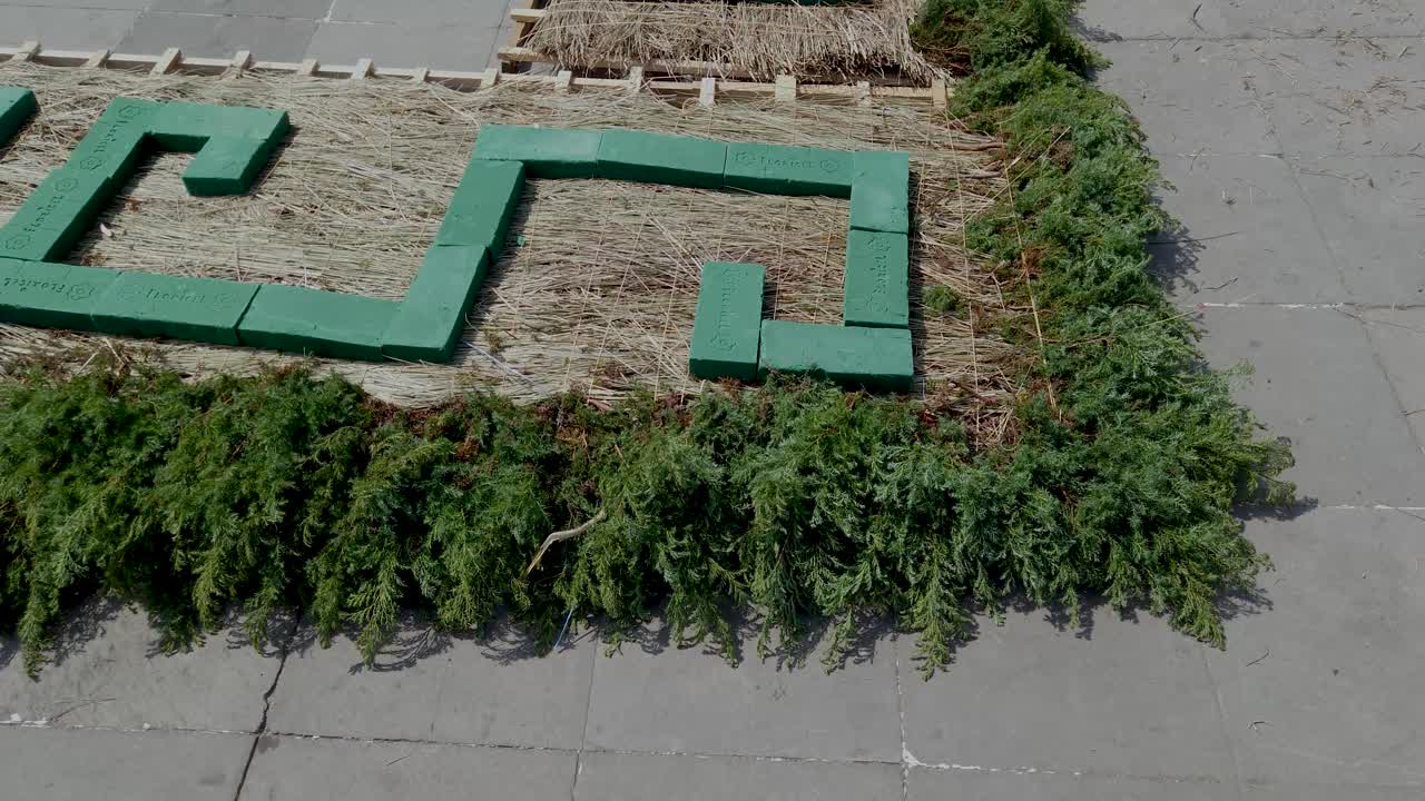 Upward shot of the preparation for placing different altars for the Day of the Dead celebration in the main square of the magical town of Tepotzotlán, Mexico