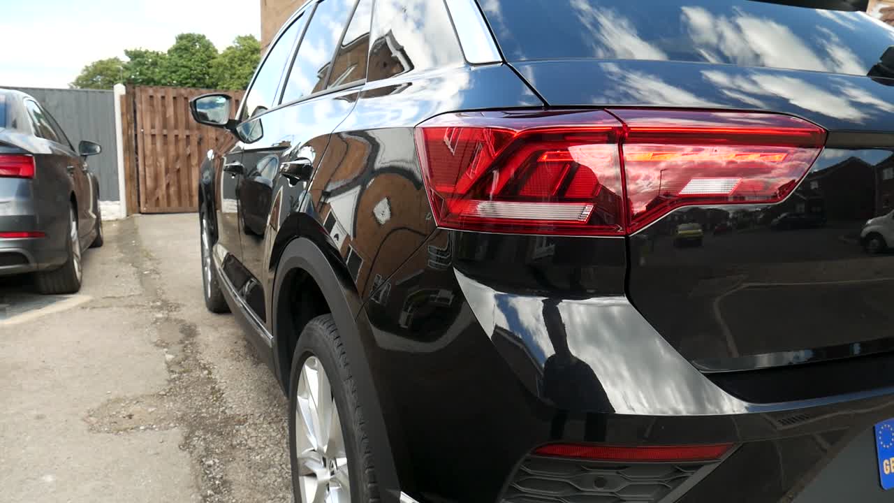 Shiny black car rear boot trunk