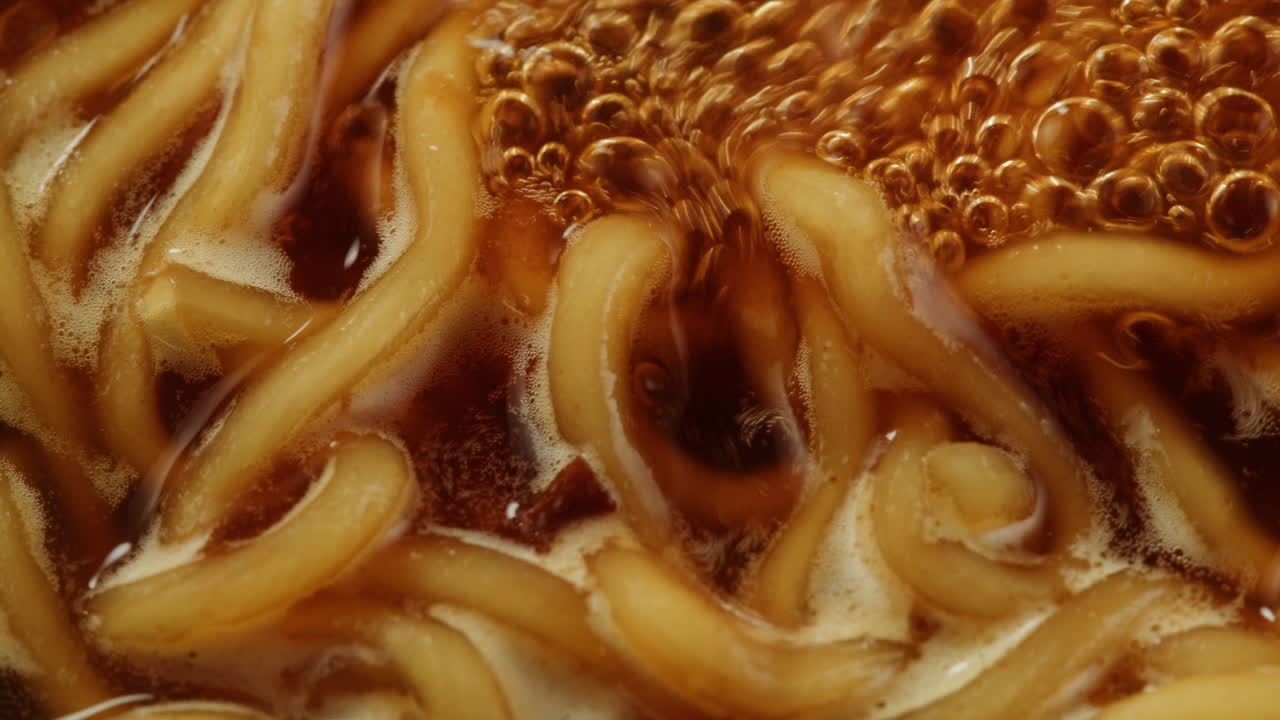 Noodles Boiling in Broth