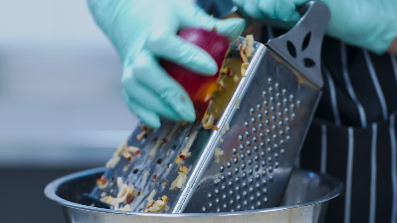 Chef Grating Vegetables