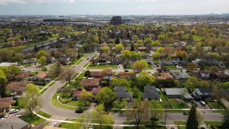 Drone-flying-towards-suburban-Brampton-neighborhood-in-the-summer