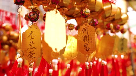 hanging golden bells with red tassels in temple