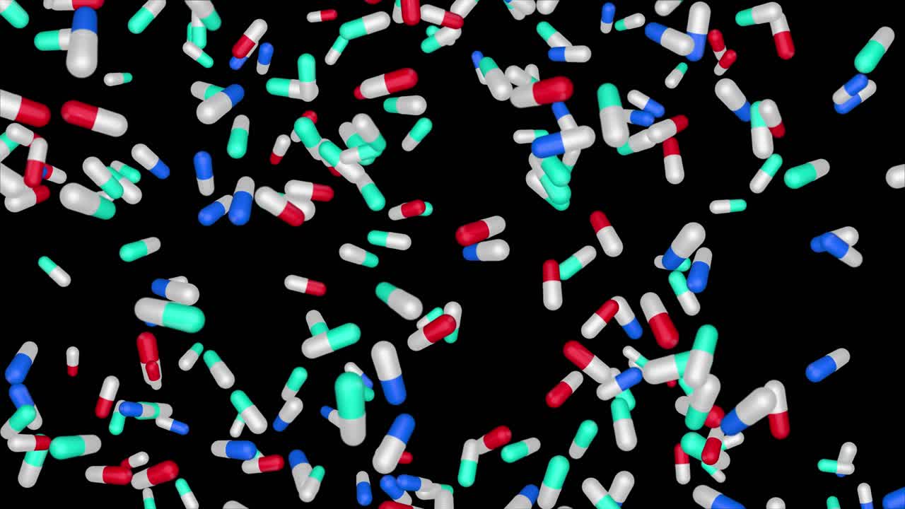 Multi colored pills tablets drugs falling down for various illnesses health science covid 19 medical