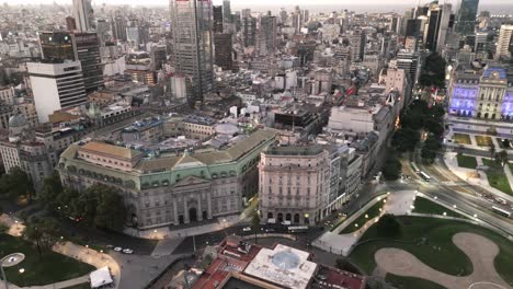 Aerial-Drone-Fly-Above-Kirchner-Cultural-Center-And-Pink-House-Casa-Rosada-Buenos-Aires-Argentina-At-Night-Near-Plaza-De-Mayo